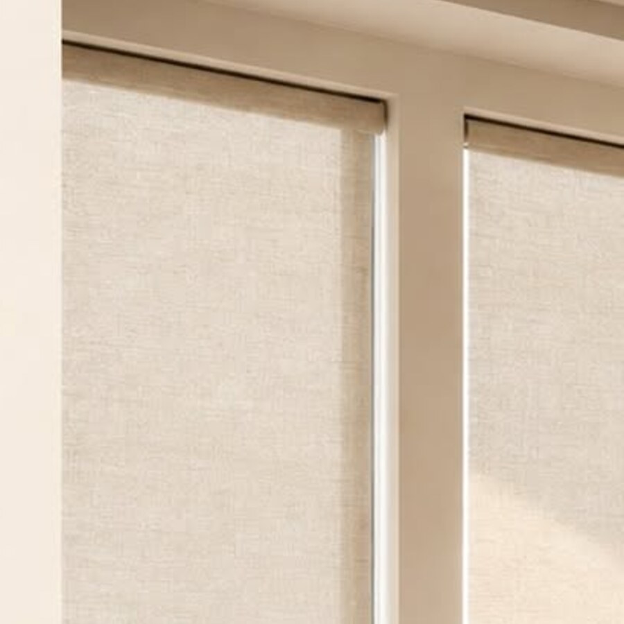 Custom light-filtering roller shades installed by Areas By Design CFL